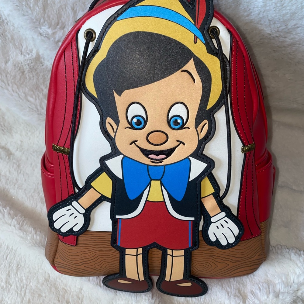 Disney loungefly Pinocchio backpack